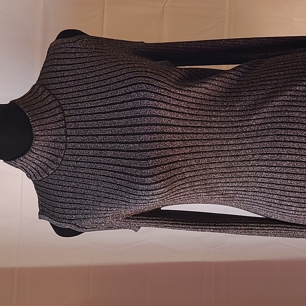 Verve ami, size large, black, ribbed knit  long sleeve with cold shoulders.